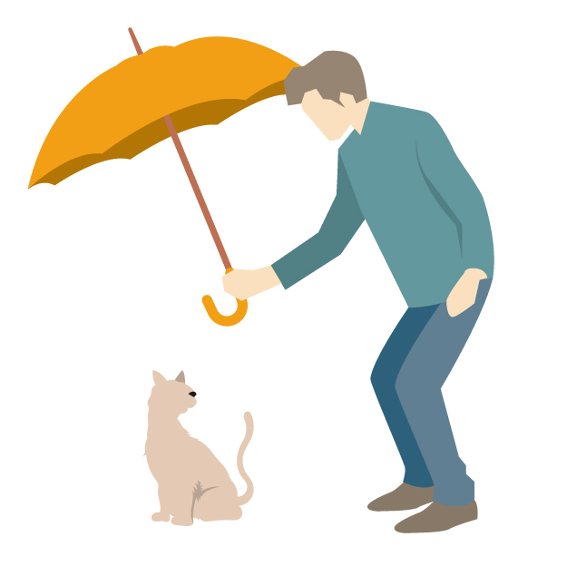 猫に傘をさしてあげる男性